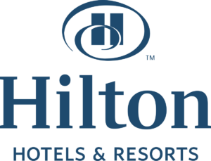 Hilton Hotels and Resorts logo, representing quality lodging options for outdoor enthusiasts in Colorado, enhancing the experience of Charter Sports' ski and bike rentals.