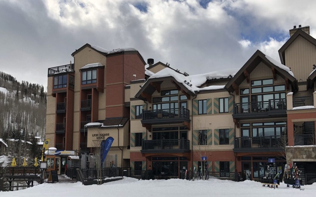 Lion Square Lodge in Lionshead Village, Vail, showcasing ski-in/ski-out access, snow-covered surroundings, and nearby ski equipment rentals.