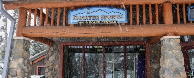 Charter Sports ski and board rentals storefront in snowy setting, featuring a prominent sign with the brand name, emphasizing local convenience for ski rentals at Copper Mountain.