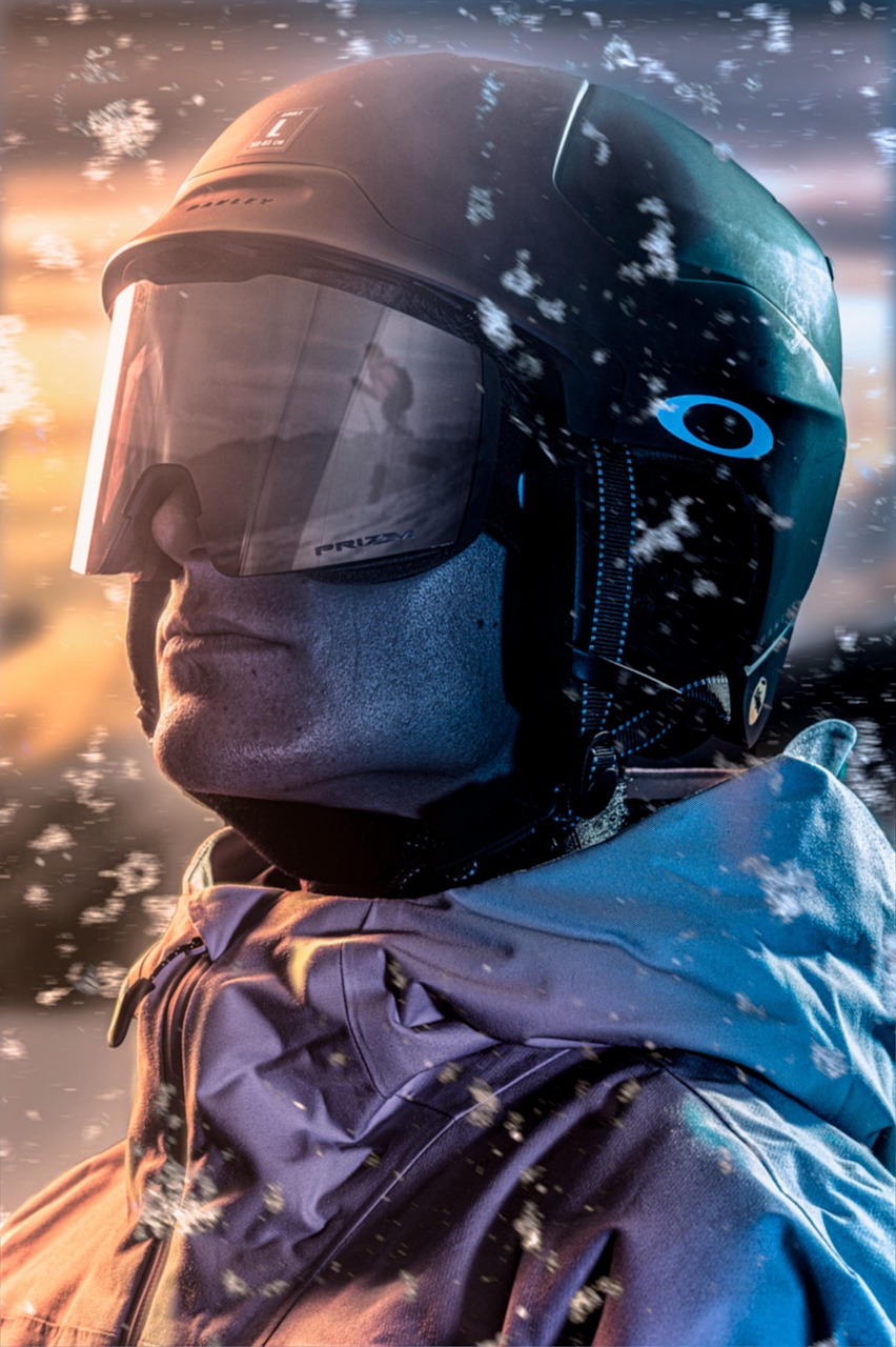 Ski enthusiast wearing a helmet and goggles, showcasing advanced ski gear in snowy conditions, emphasizing performance and safety for skiing at Copper Mountain.